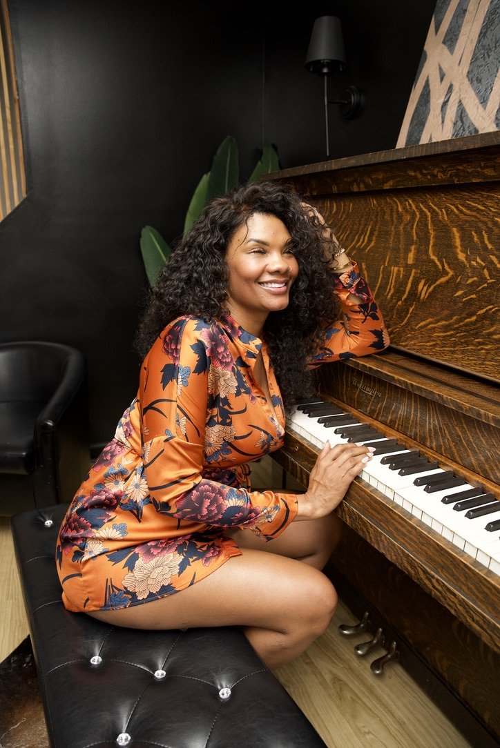 Portrait at piano, natural smile