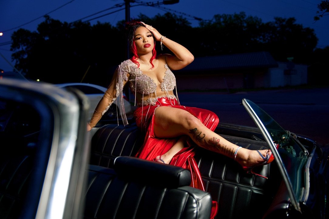 Prom portrait on classic car at blue hour