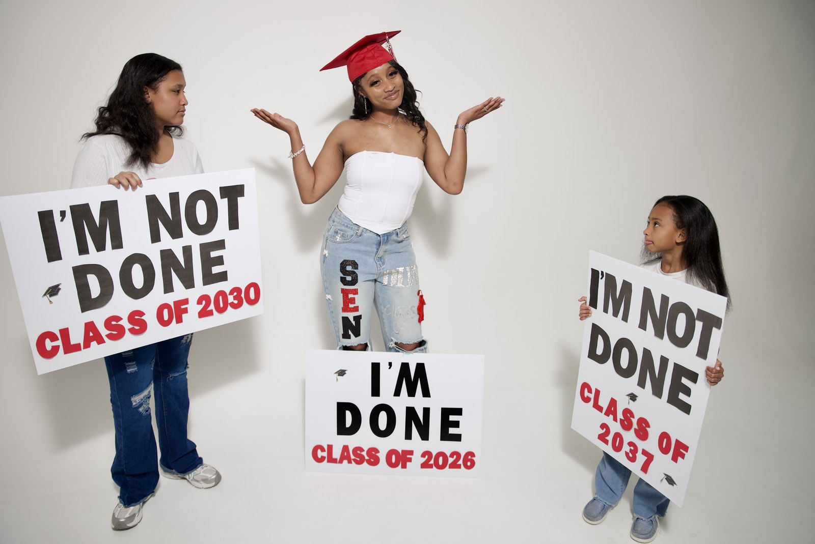 Graduation portrait session with three sisters
